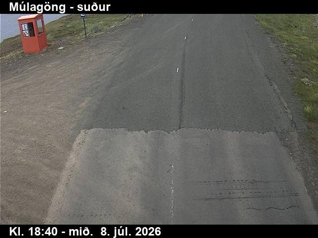 Snapshot from Múlagöng suður — Múlagöng séð niður á veg til suðurs